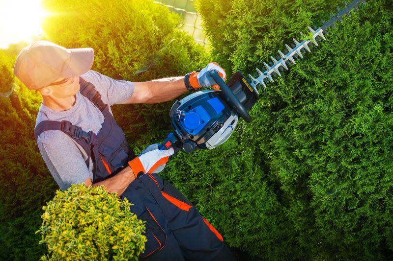 Landscaper with Trimming Tools